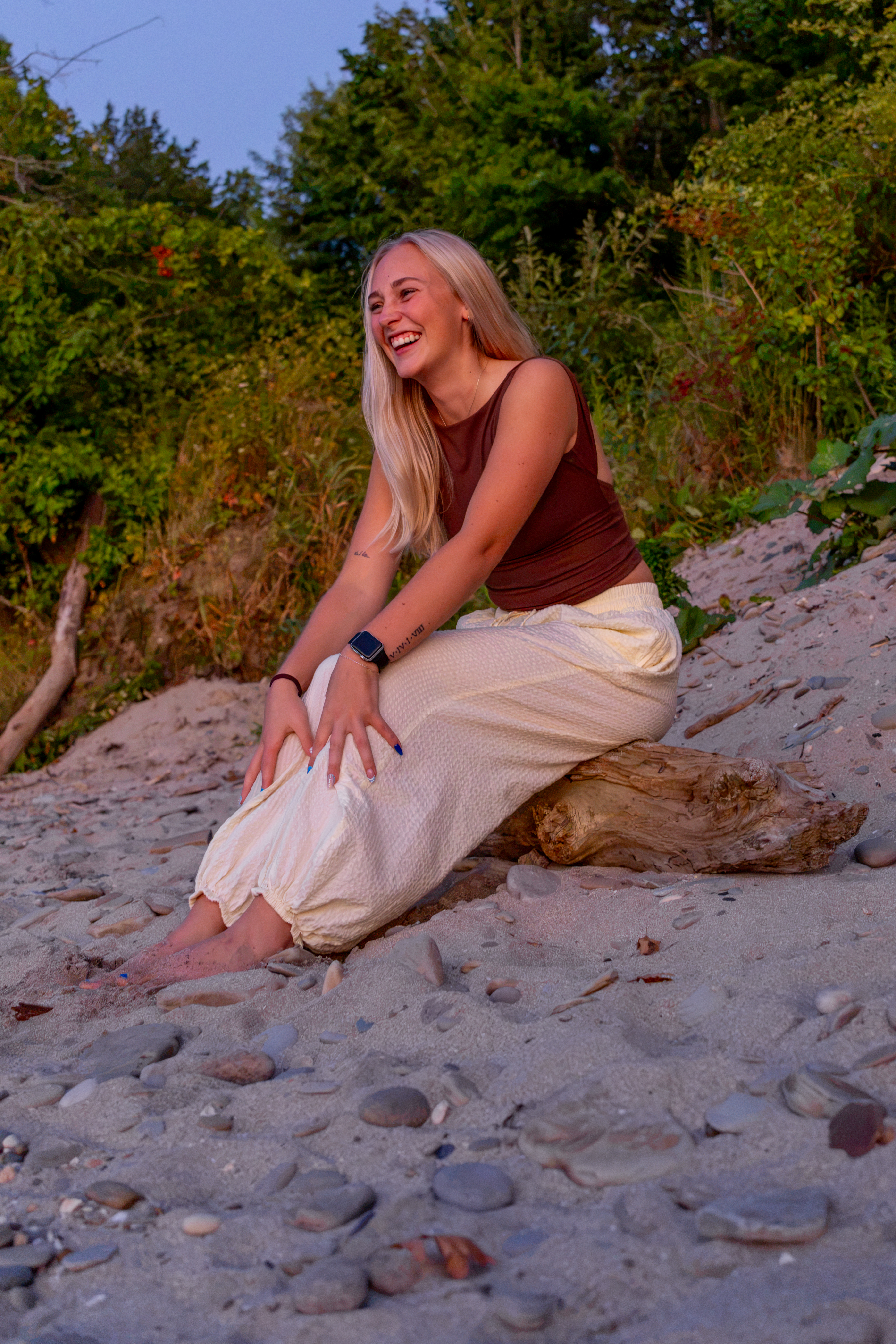 A moment between poses, the subject laughing at something that was said.